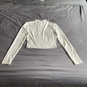 White and light long sleeve low turtle neck